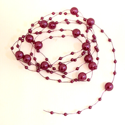 Guirlande de perles fuchsia